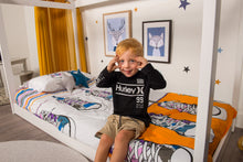 Load image into Gallery viewer, organic-cotton-quilt-cover-set-streetwise-shoes-yellow-and-white-streetwear-single-display-boy-sitting-on-bed