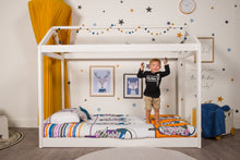 Load image into Gallery viewer, organic-cotton-quilt-cover-set-streetwise-shoes-yellow-and-white-streetwear-single-display-boy-standing-on-bed