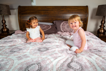 Load image into Gallery viewer, Organic-Natural-eco-friendly-cotton-sateen-quilt-cover-set-Diana-dusky-pink-king-size-two-little-girls-sitting-on-bed-image